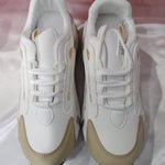 Close-up detail of men's colorblock lace-up sneakers