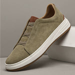 Side view of men's leather soft-sole sneakers