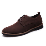 Front view of men's leather and suede casual sneakers
